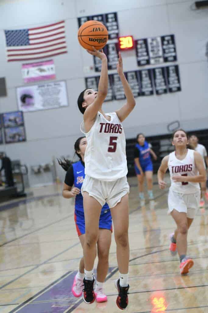 Photo - Torres’ Kaylin Perez goes up to score two of her team-leading 14 points in Tuesday’s win.