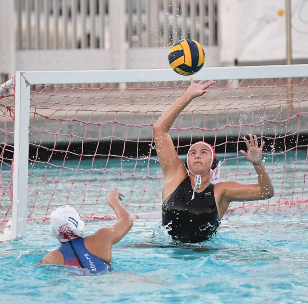 Photo - Madera South goalie Jatzelle Salazar blocks a Sanger shot during Tuesday’s Senior Night loss to the Apaches.