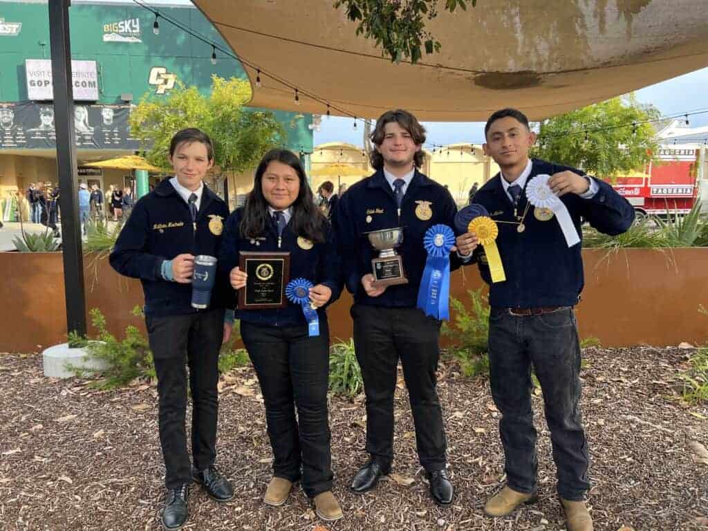 Photo - From left, Mathew Machado, Anita Giron, Caleb Fant and Oswaldo Montes hold awards they won during the state competition at Cal Poly on May 5.