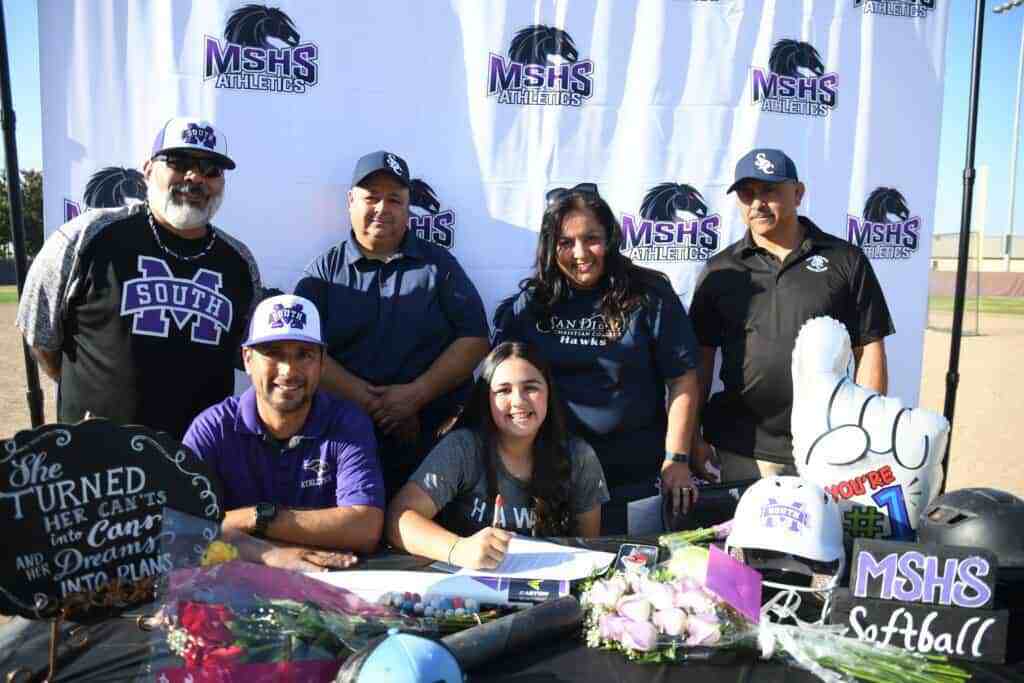 Photo - Valerio signs letter to San Diego Christian