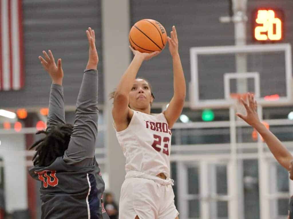 Photo - Matilda Torres’ J’Lynn Mitchell rises up for a jumper to score two of her team-high 20 points in Monday’s victory over the Justin Garza Guardians.