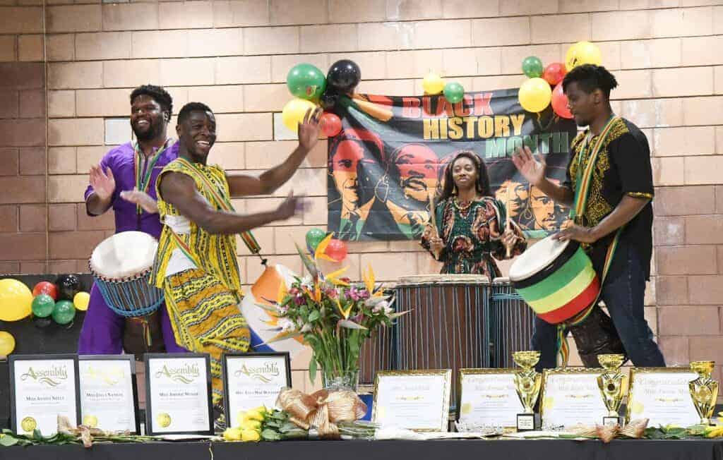 Photo - The African Drum Interactive musicians entertain the crowd during the Black History Month Celebration.
