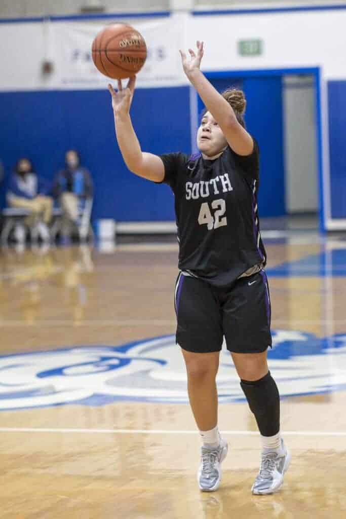 Photo - Madera South’s Alannah Ward shoots a 3-pointer during Friday’s victory over the Madera Coyotes. Ward hit eight of 11 3-point attempts for a game-high 24 points in the 51-40 victory over the. She was one of three Stallions in double-figures.