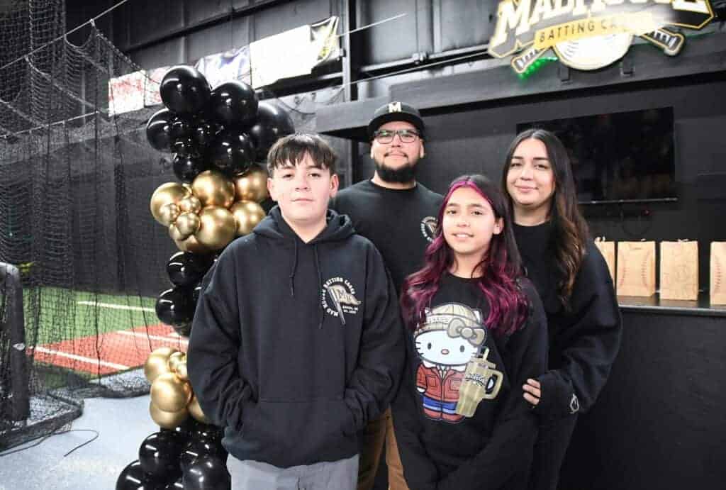 Photo - Madhouse Batting Cages owners, Alex Barajas and Letty Velarde along with their children, Alejandro and Giselle Barajas hosted a ribbon cutting and grand opening event on January 12.