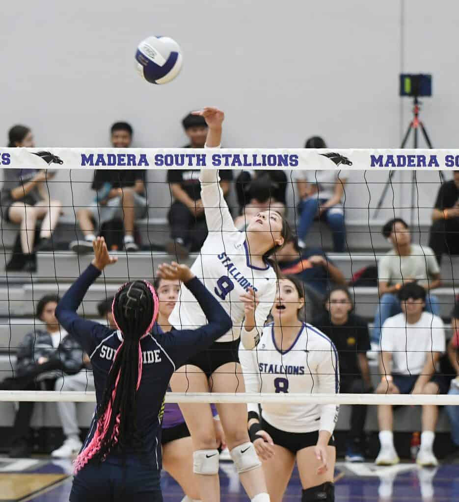 Photo - Madera South’s Danae Prudente rises up to put down one of her seven kills in Tuesday’s win over Sunnyside. She also served up nine aces in the sweep.