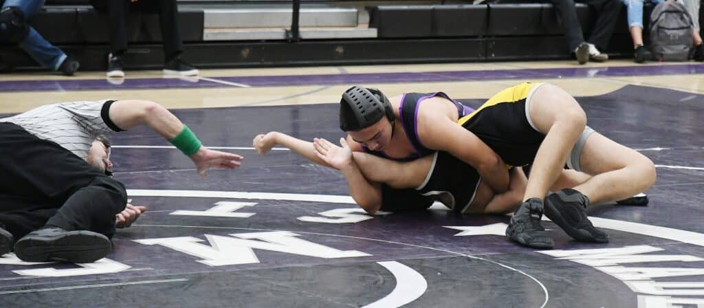 Photo - Madera South’s Joseph Munoz works his 152-pound Edison opponent into a pin during Wednesday’s dual meet victory.