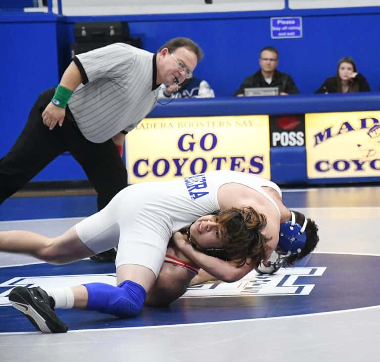 Wrestling opens bid for 10 with win