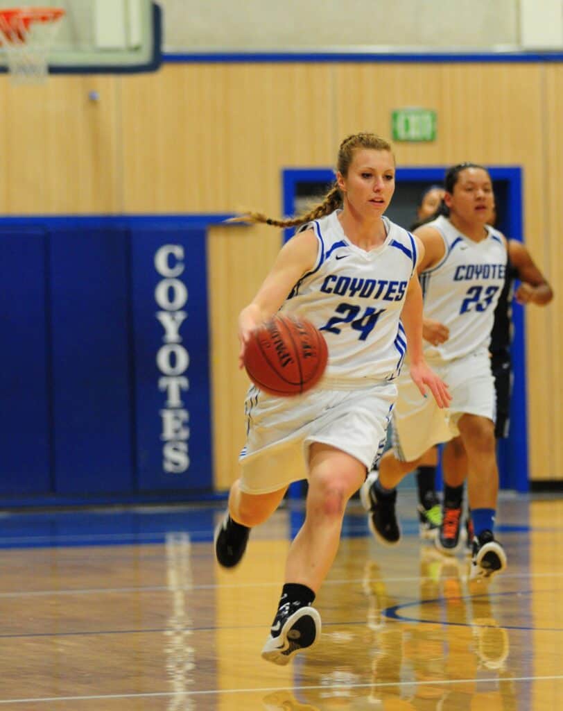 Photo - Madera’s Shellie Perkins pushes the ball up the court during a 2012 victory over Bullard. She scored a season-high 17 points in the upset over the ninth ranked Knights.