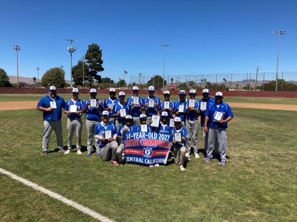 Photo - The Madera Babe Ruth 14-year-old All-Star team shows off their championship plaques and banner after winning the Central California State Tournament in Santa Maria last week.