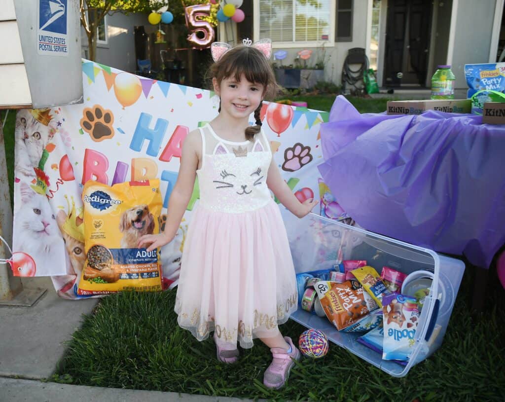 Photo - Leia Garcia celebrated her fifth birthday by collecting donations for the Madera County Animal Shelter during a drive thru event on Friday.