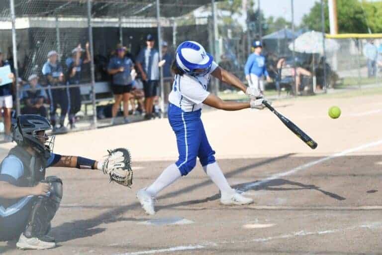 Record breaking homer highlights softball sweep