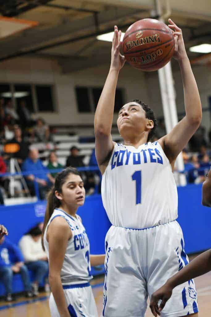 Photo - Madera’s BriAnn Houghton drives to the hoop against the Edison Tigers. Houghton scored a team-high 10 points in Wednesday’s game.