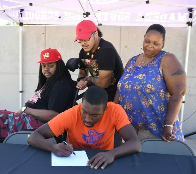 Green signs late to Fresno Pacific