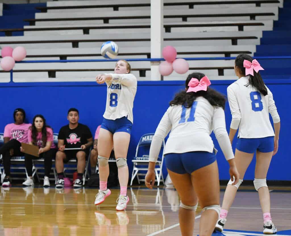 Photo - Madera’s Emily Lopez records a dig to set up the Madera offense during Tuesday’s three-set sweep to the Bullard Knights. Lopez led the team in digs and was all over the back line with diving digs.