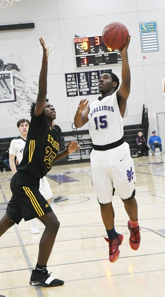 Photo - Madera South’s Jayshawn Thomas drives for a layup. Thomas scored 10 points in a loss to Sanger on Friday.