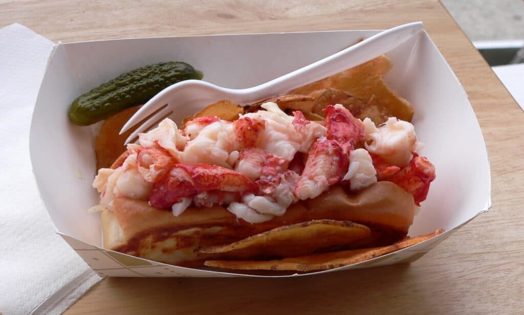 Photo - Enjoy a sandwich roll filled with imitation crab or lobster, made into a salad.
