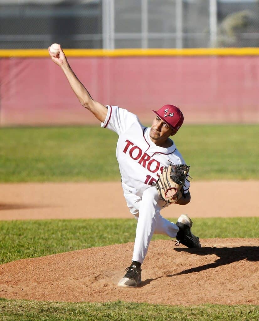 Photo - Matilda Torres’ Harnoor Hans throws a pitch during Tuesday’s victory over Roosevelt. Hans struck out seven in 4 1/3 innings pitched. He allowed four hits and two runs in the win.