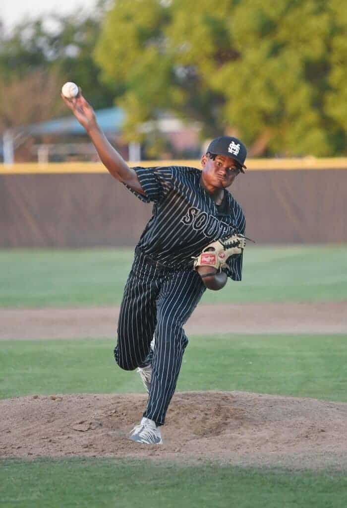 Photo - Madera South ace Murf Gray throws a pitch during Thursday’s loss to the Edison Tigers at Eddie Chapa Field.