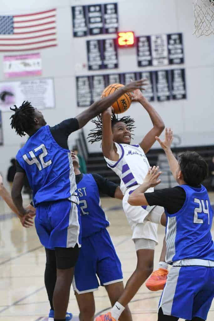 Photo - Madera South’s Maurice Snowden drives the lane for a shot during Thursday’s North Yosemite League victory over Sanger West. Snowden led the Stallions with 19 points. 