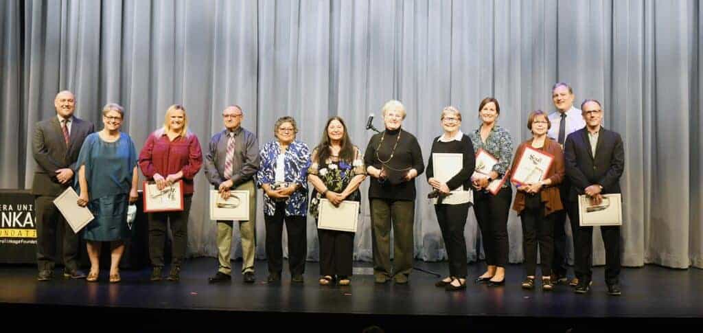 The Madera Linkage Foundation sponsored the student Champion Hall of Fame Awards held at Torres High School on Oct. 19. From left are Madera Unified School District Superintendent Todd Lile, recipient Anastasia O’Neill teacher, on behalf of recipient Patricia Butler, her daughter Kathy Butler Forga, recipient Carles Beckett, on behalf of Joe Flores, his daughters Joetta Fleak and Dr. Marcella Evans, recipient Pat Schwartz, recipient Kathy Davis, on behalf of Perry “Frank” Smith, his daughter Julie Smith-Reid, recipient Kathleen Lopes, Tim Riche’ and recipient Mike Lennemann, Madera Linkage Foundation President. Photo - Linkage announces Hall of Fame inductees