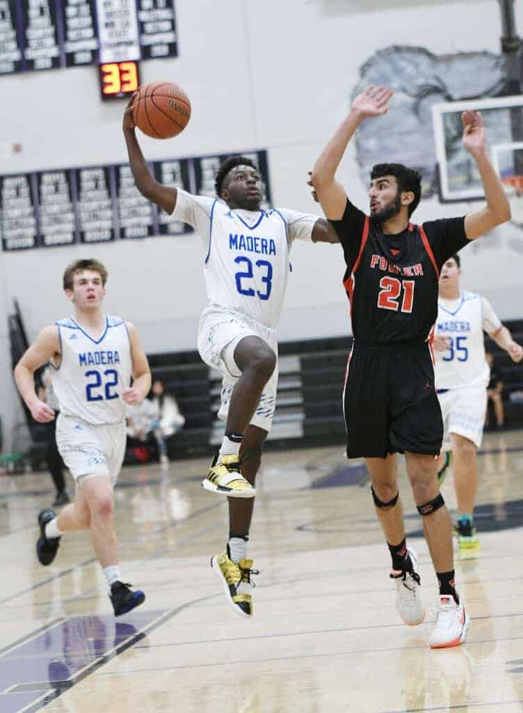 Photo - Senior Kecian Primes was the Madera Coyotes boys basketball coach David Lozano’s selection for his Madera C.H.A.M.P.S. award, which is an award given to a player on each team that exemplifies Character, Hardworking, Attitude, Motivated, Positive and Successful.