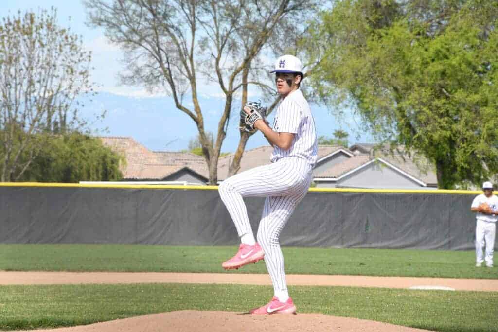 Photo - Madera South’s Gilbert Moisa throws a pitch during Thursday’s 9-3 victory over the Sunnyside Wildcats. Moisa tossed a complete game, and also had a double and a triple at the plate.