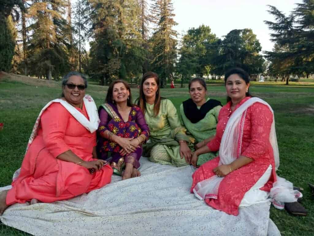 Photo - From left: Ranjit Hans, Meena Gill, Ranjit Gill, Daljit Gill and Baldesh Kaur enjoy the evening while catching up.