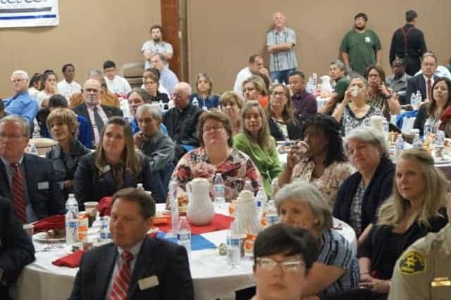 Photo - The audience listens intently to the day of prayer’s featured speaker.