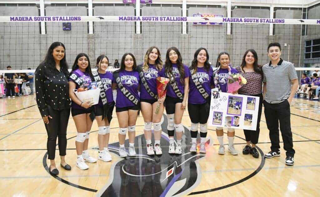 Photo - The Madera South Stallions honor seven seniors before Tuesday’s Senior Night match with Fresno. From left are coach Lilly Martinez, Yoviedra Sierra, Limairy Arzola, Yajaira Vasquez, Hannah Eades, Diana Moreno, Angelina Aguirre, head coach Madison Devine and coach Sebastian Moreno.