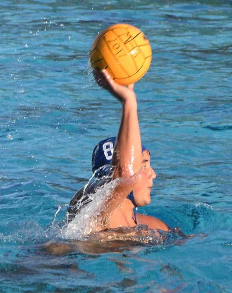 Photo - Madera’s Robbie Niino rises up for a pass during Tuesday’s loss to Sanger. He scored two goals to lead the Coyotes.