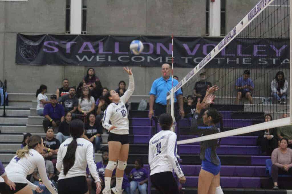 Photo - Madera South’s Angelina Aguirre rises up for a kill attempt during a five-set loss to Sanger West on Tuesday. She was second on the team with 11 kills.