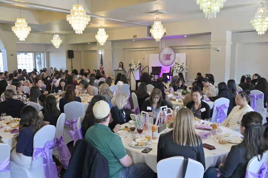 Photo - A crowd packs the room at the Madera Municipal Golf Course for the sold out Madera County Women’s Network Luncheon on Friday.