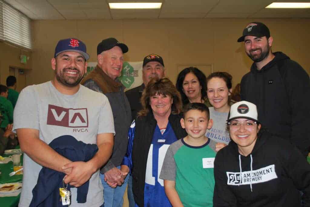 Photo - Providing funds and programs and projects for the Howard 4-H Club, members gathered on Super Bowl Sunday morning in the Joe VanAlen Hall at the Madera District Fairgrounds to serve an annual breakfast that has become a community event.