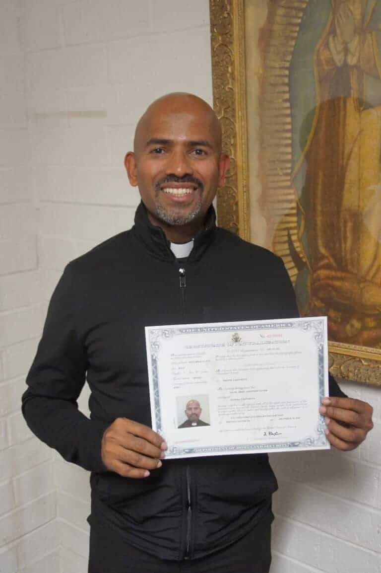 Local priest becomes a U.S. citizen