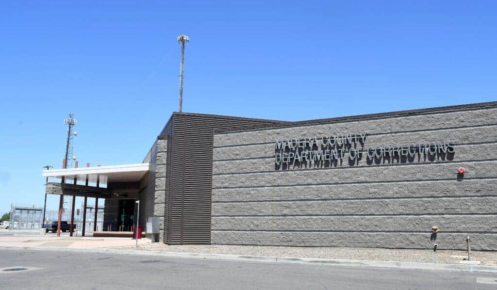 Photo - The Madera County Department of Corrections is having to deal with the effects of the coronavirus, according to relatives of prisoners and members of the jail staff. Some prisoners scheduled for release have been held back, and prison staff members who have been treated for the illness.