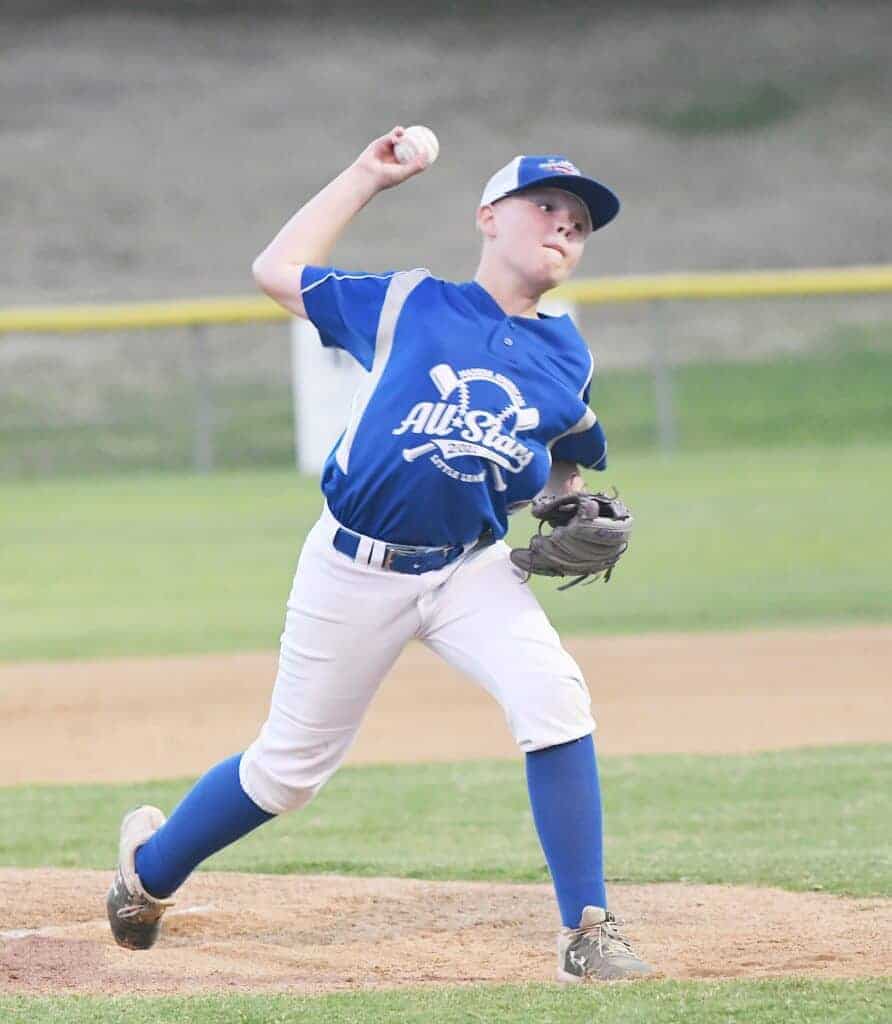 Photo - Madera American’s Sammy Molina throws a pitch during a 10-0 victory over River Park to advance the 10-11-year-old All-Star team to the District 10 championship game on July 1.