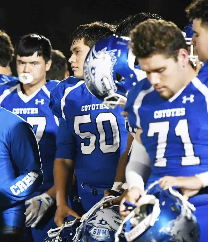 Photo - Madera’s Scott Martinez (50) prepares to enter the game for the Coyotes’ football team in 2019. Martinez earned one of six Central Valley service academy nominations from state Congressman Jim Costa’s office.