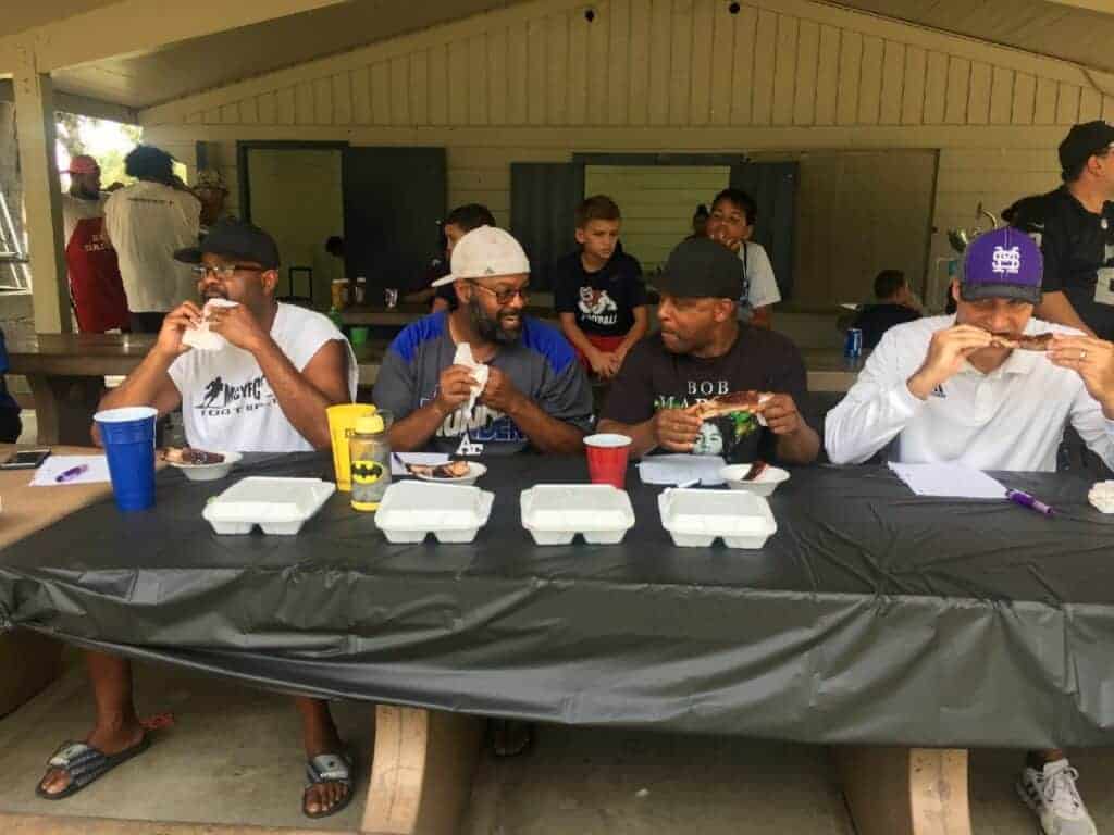 Photo - From left, Alex Smith, Alex Smith, Reggie Henderson and Matt Johnson judge the entries from last year’s Q’N For Kids cooking competition. This year’s competition will be Aug. 3 at the American Legion, Post 11 headquarters.