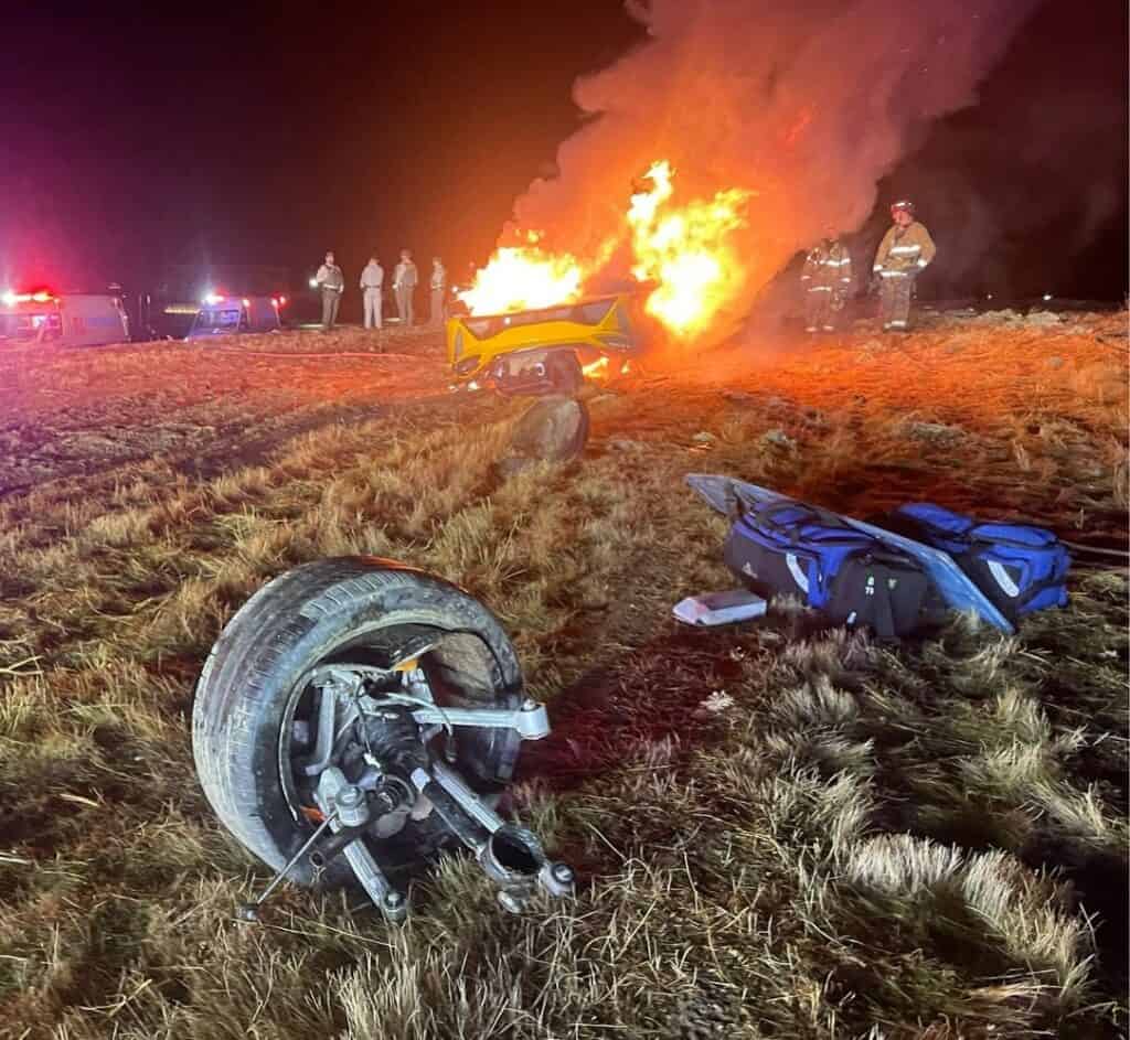 Photo - A yellow McLaren lies on its hood after a single-vehicle roll-over early Saturday morning. The driver sustained major injuries, and the passenger sustained minor injuries.