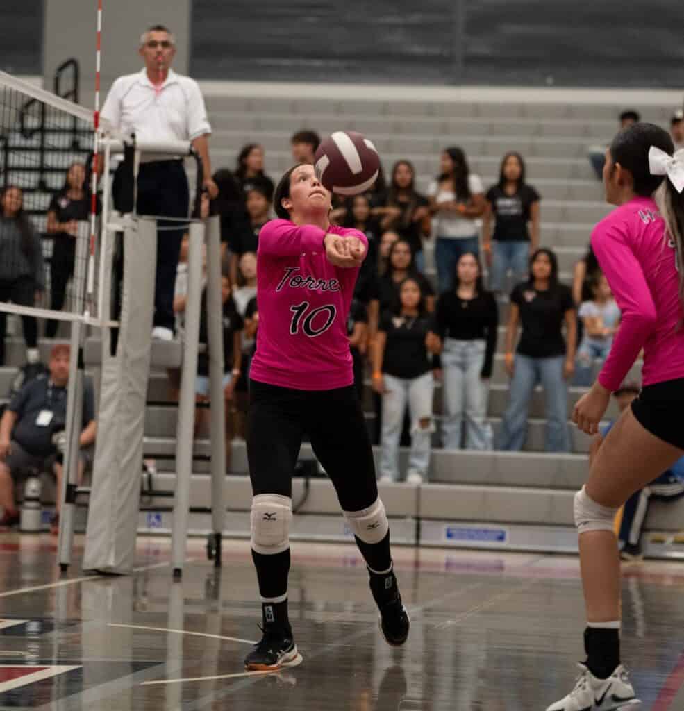 Photo - Torres setter Tarin Anderson uses the bump set to start the Toros’ offense in Tuesday’s five-set victory over Roosevelt to claim a share of first place in the North Yosemite League.