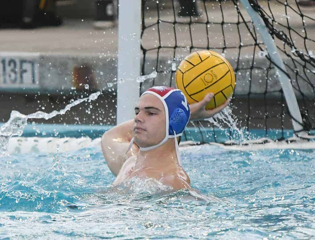 Photo - Madera goalie Ben Prim looks for a pass. He recorded five first half saves during Friday’s 9-6 quarterfinal victory over Tulare Western.