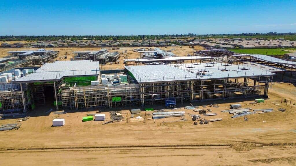 Photo - A drone view shows construction progress on King Husein School. The new TK through 8 campus is scheduled to open in August 2026.