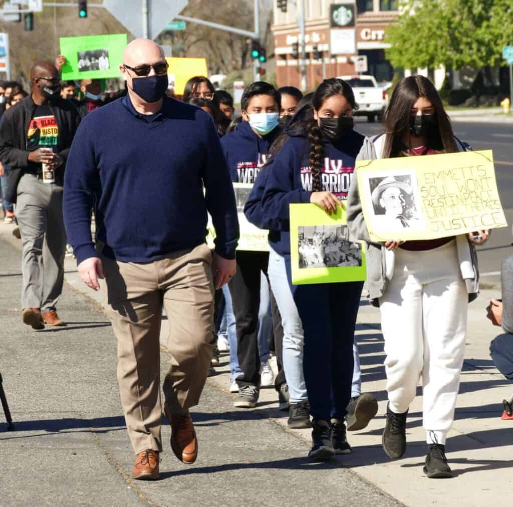 Photo - Superintendent Todd Lile marches with student historians.