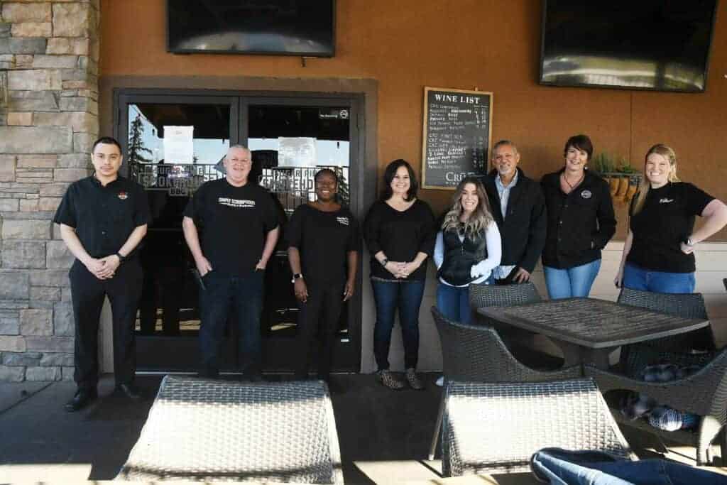 From left, Eduardo Sandoval of Sal’s Mexican Restaurant, Ray Roberts of Simply Scrumptious Grill & Pub, Moneshay “Moe” Platt of MoJo’s Catering Services, Lisa Gill of Sugar Pine Smokehouse, Kym Salter, administrator of the Madera To Go Facebook page, George Buenrostro of TJ’s Bar & Grill, Stacey Cornaggia-Miller of Backstreet Bar & Grill and Kim Praytor of The Waffle Spot gather at Sugar Pine Smokehouse to show their support for their fellow business owners and the community of Madera.