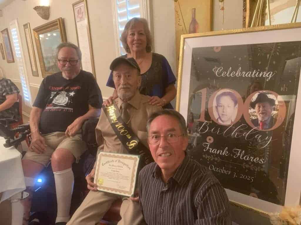Photo - Frank Flores (center) celebrates his 100th birthday, and poses with his three children. From left are Ron Flores, Debbie Evans, and Randy Flores.