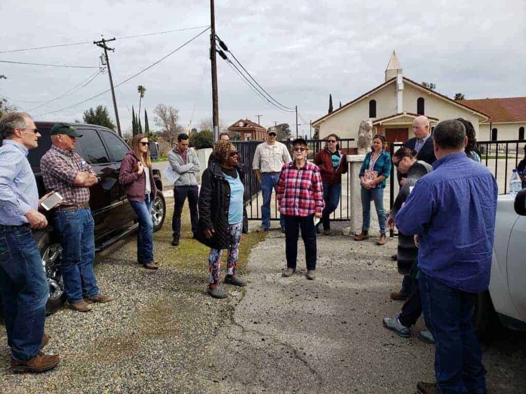 Fairmead residents Barbara Nelson, center left, and Elaine Moore, center right, share theirwater experiences there with growers who at tended a special groundwater Advisory Committee meeting Friday at various county locales.