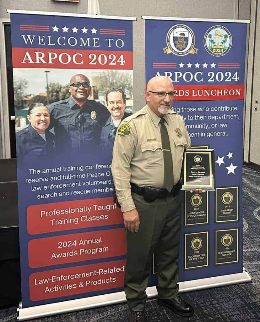 Photo - Madera County Sheriff’s Officer Reserve Deputy Les Esparza is honored with the 2024 California Reserve Peace Officers Association’s Meritorious Service Award at a conference in August.