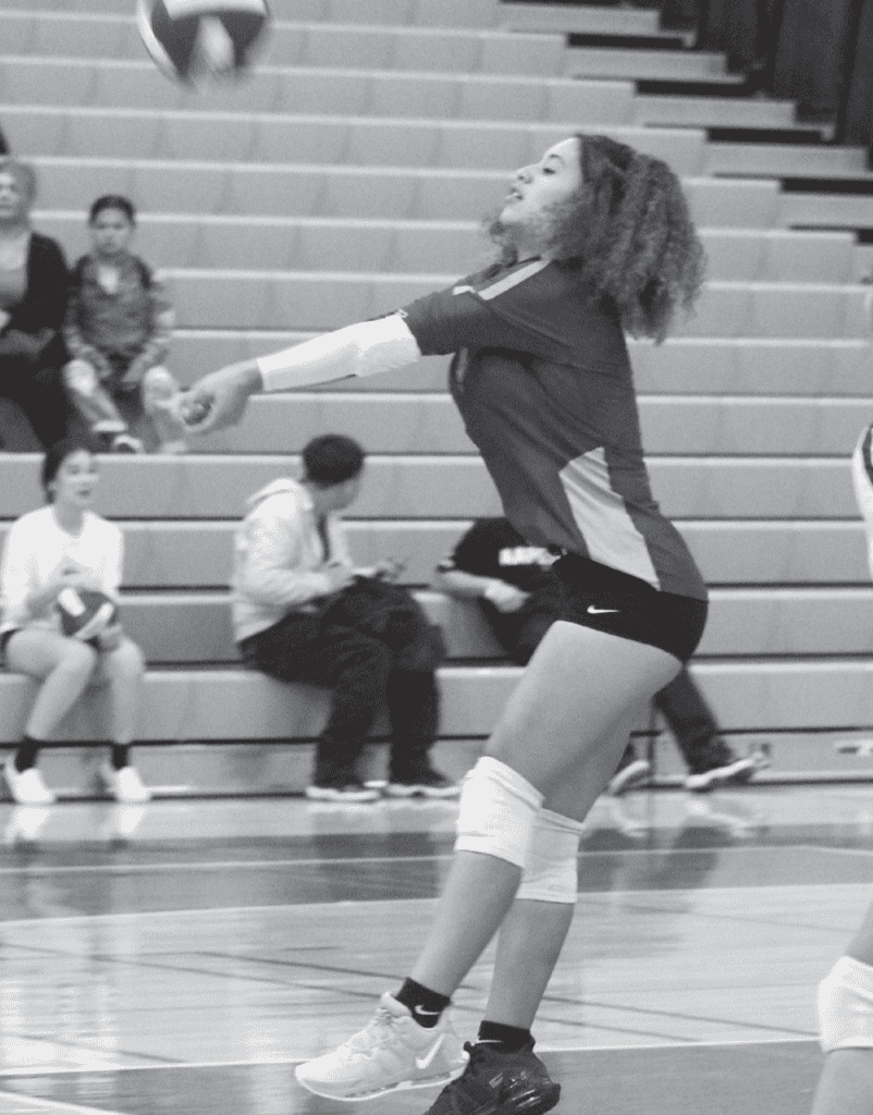 Photo - Torres libero Bryance Gonzalez makes a dig to start the offense during Tuesday’s match with Hoover. Gonzalez helped the Toros to take a set off the league-leaders in a four-set loss.