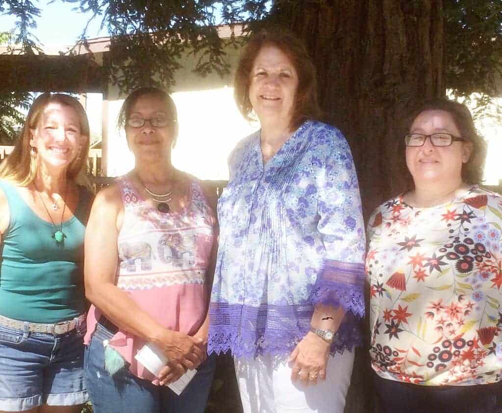 Photo - From left: PEO Sisterhood Scholarship Committee member Teresa Hall, scholarship recipient Kim Gray of Chowchilla, PEO Chapter VO president Cathy Wieland, and chapter recording secretary and scholarship committee member Terri Martinez.