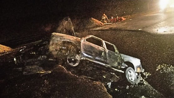 Photo - An approximate 10-foot gap on Avenue 26 is washed away because of the January storms. Barricades were put in place, but didn’t stop the driver of a truck from going through the gap.